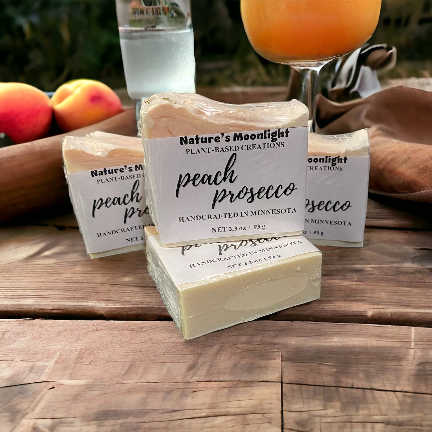 Peach Prosecco vegan body bar with swirls of cream and peach colors.